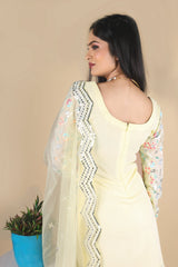 Light yellow sharara suit with embroidery work. It has a plain sharara and net dupatta. 