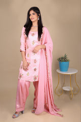 Pink chinon silk patiala salwar kameez with a plain georgette dupatta. The kameez has work on the front and back. 