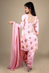 Pink chinon silk patiala salwar kameez with a plain georgette dupatta. The kameez has work on the front and back.